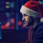 hacker wearing a Santa hat