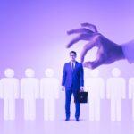 man in suit being selected
