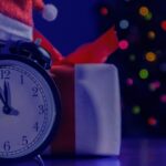 alarm clock with Santa hat and gift