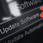 black and white update software screen and red cross check mark