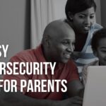 parents showing kid how to use the computer