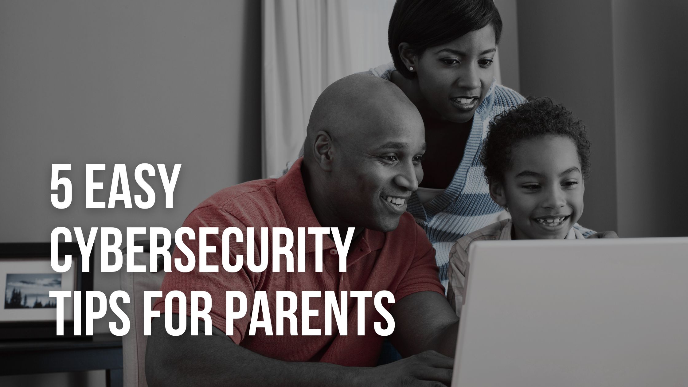 parents showing kid how to use the computer