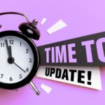 alarm clock and text on purple background