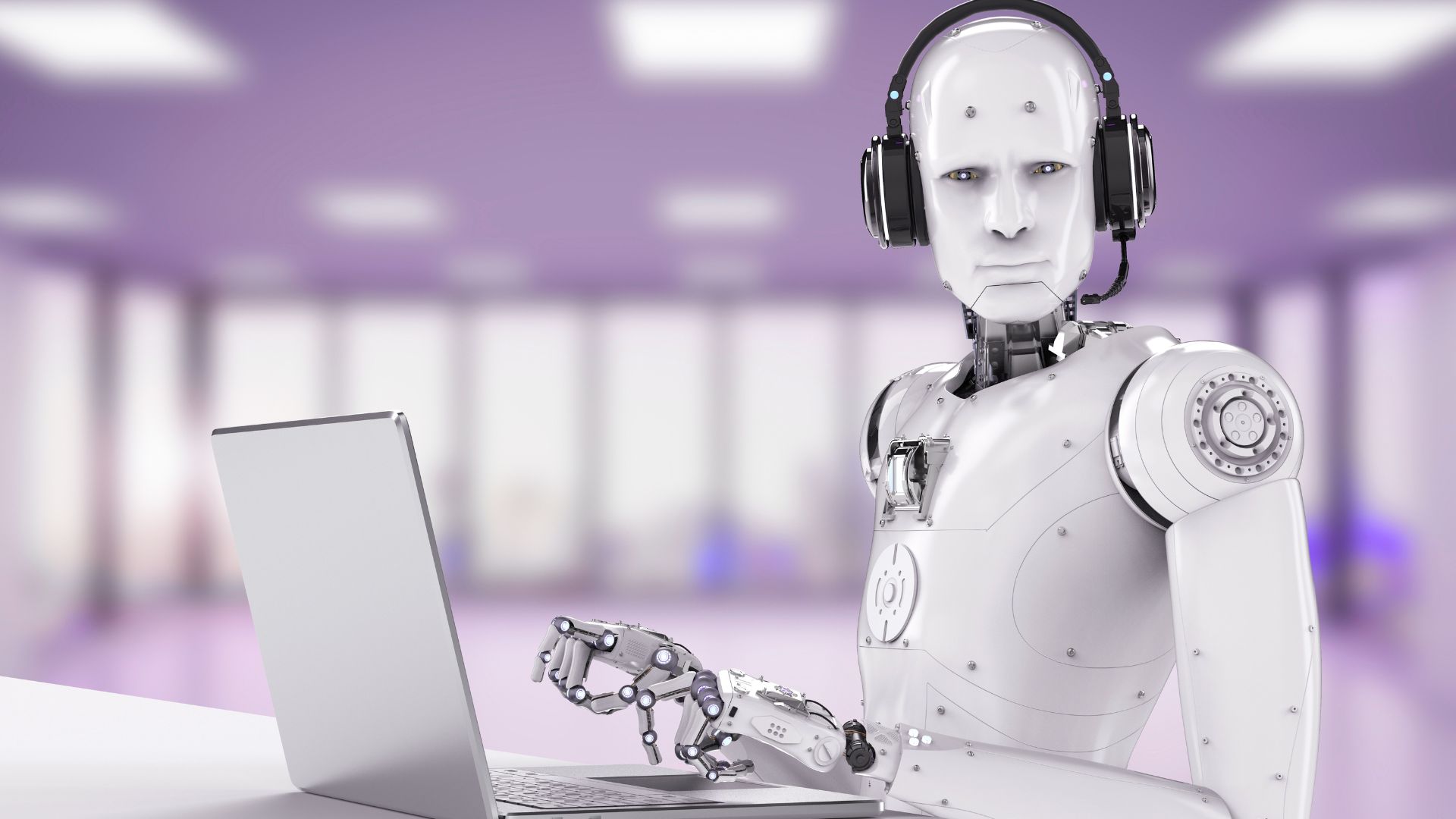 Robot wearing a headset and working on a laptop