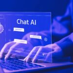 Person typing to an AI chatbot on their laptop