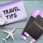 Travel tips, passports and plane figurine