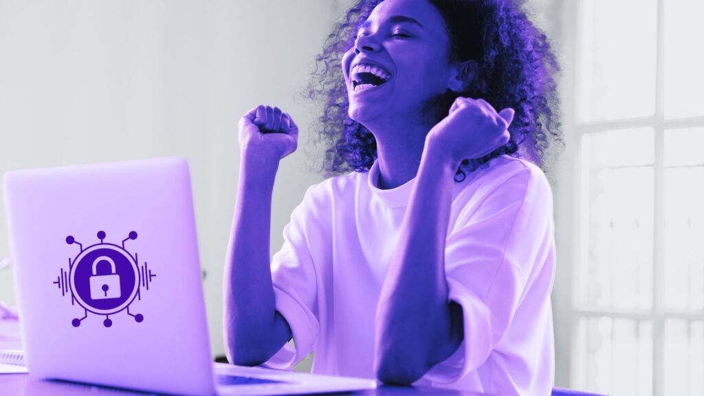 person in front of laptop excited about the cybersecurity wins for the weekend