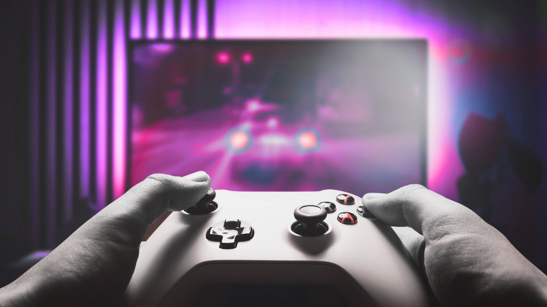 Person playing a game on a console